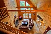 Loft looking down into Living Room of this 2 bedroom cabin near Gatlinburg